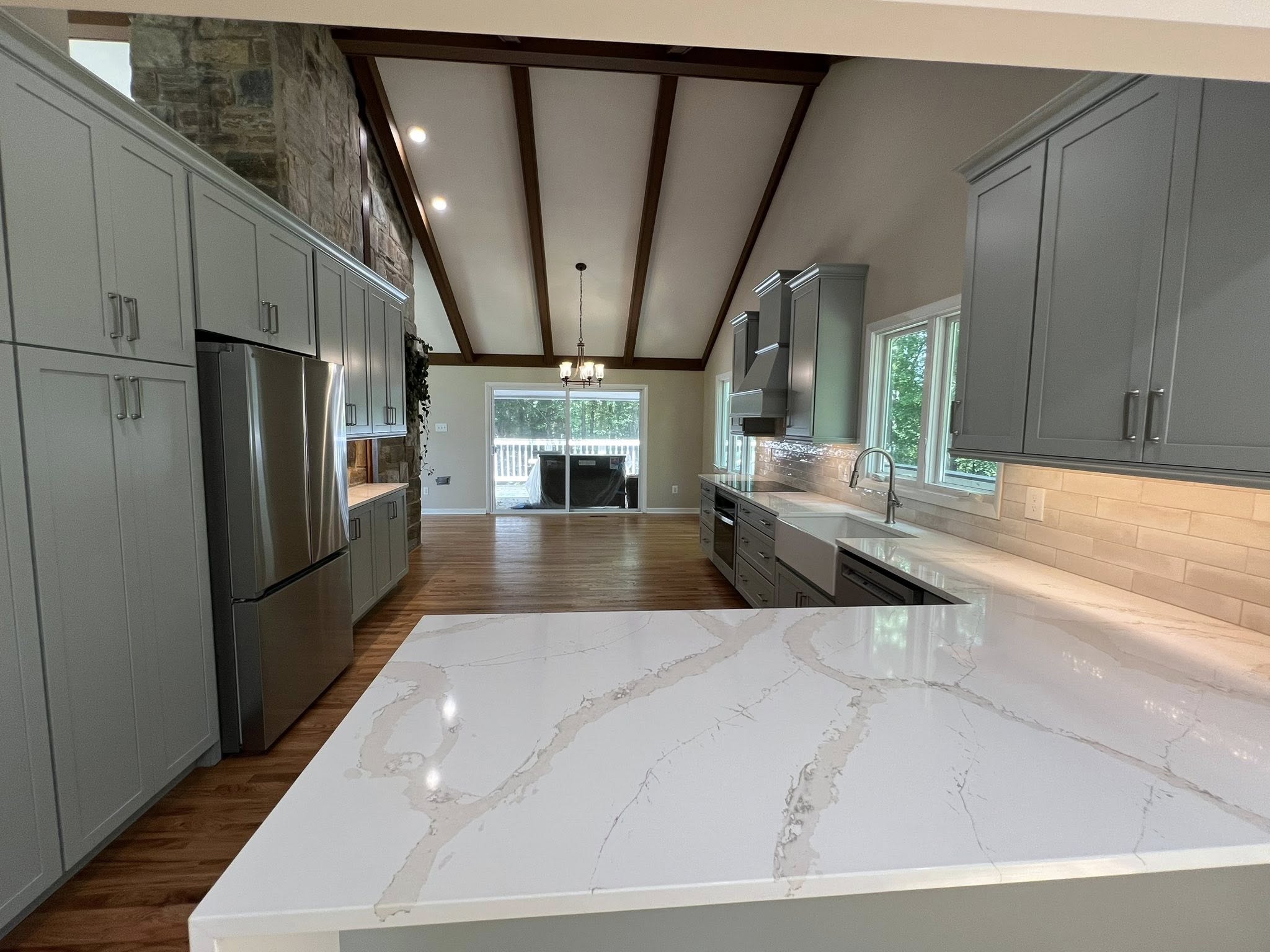Kitchen after remodeling Warrenton VA quartz countertops gray cabinets Berry Good Builders